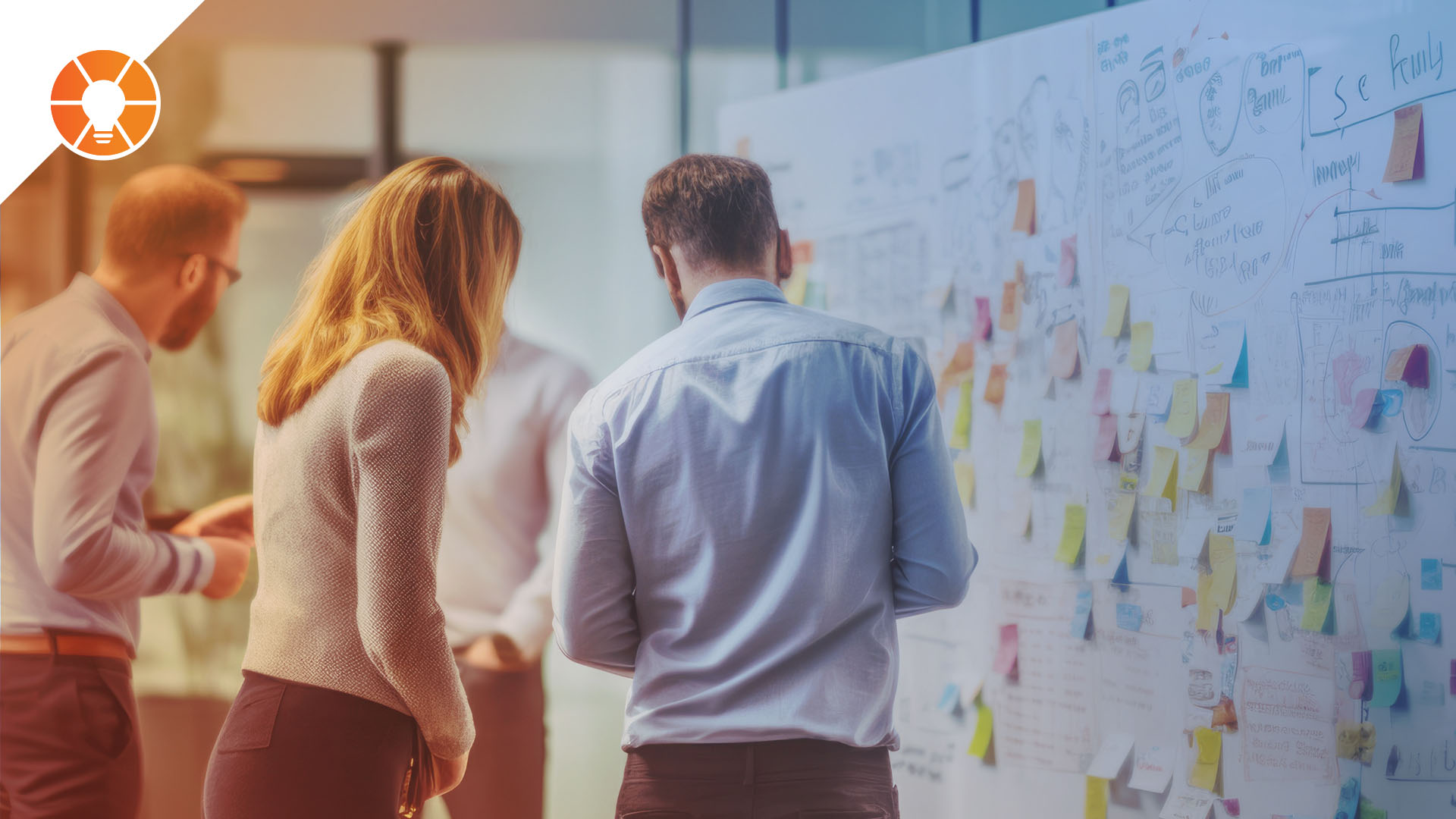 People discussing marketing strategy at a whiteboard with notes